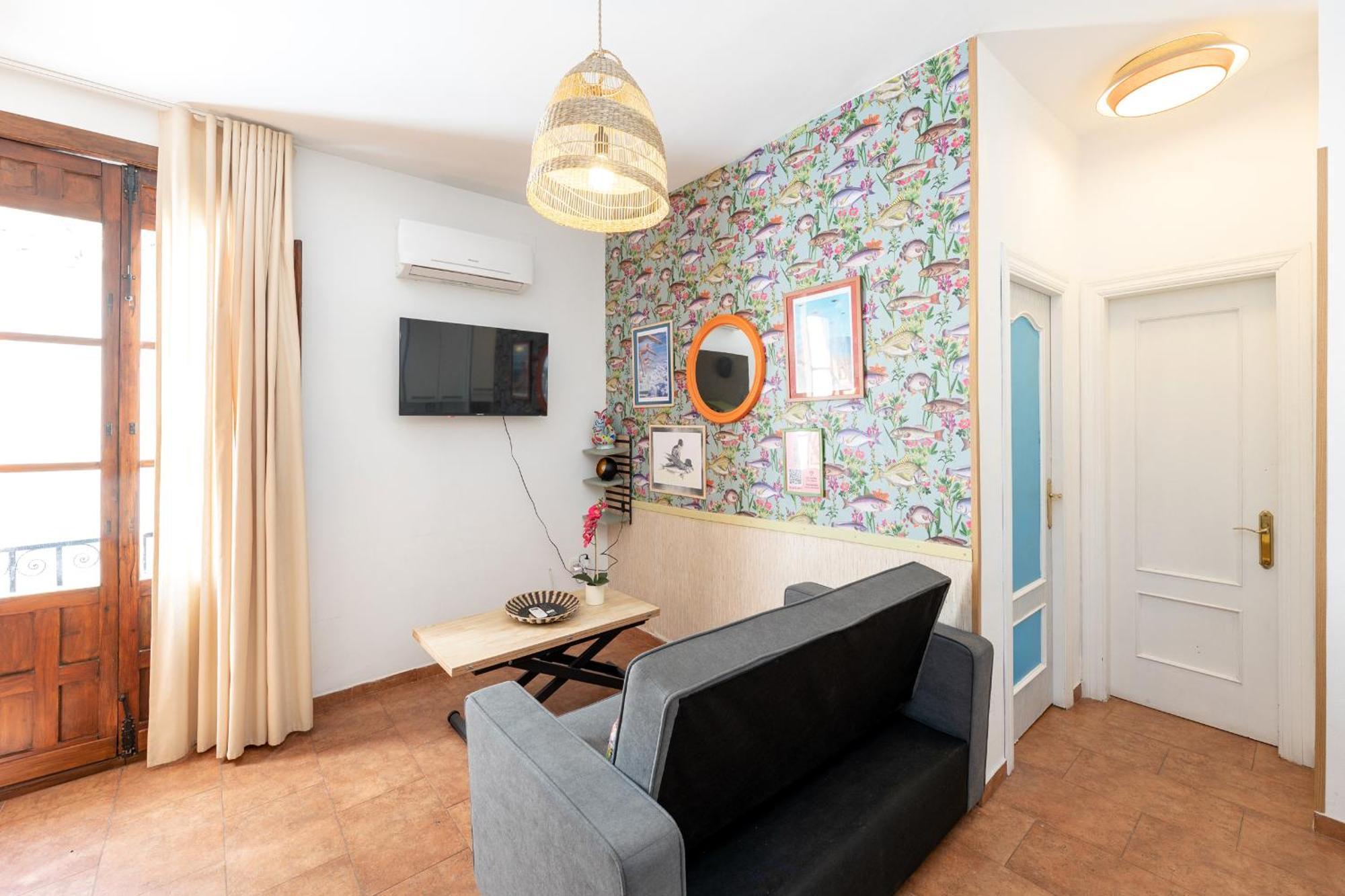 Apartamentos - Pinksparrow - Granada Pokoj fotografie
